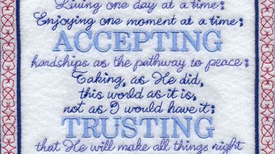 Close up of a hand embroidered prayer